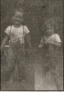 Jay and Jill Hanson home  covered with mud after playing at a nearby construction site on Juler Avernue in the late 1940's.